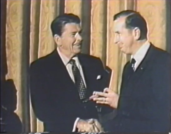 Ronald Reagan shaking hands with Dr. Cory.